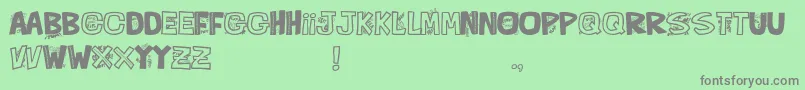 En savoir plus sur la police QueFontita21 Police QueFontita21 – polices grises sur fond vert