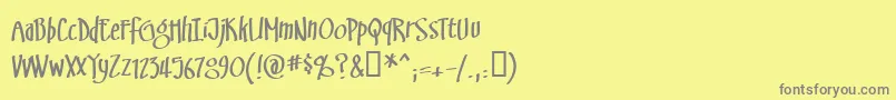フォントSwinsbrg – 黄色の背景に灰色の文字