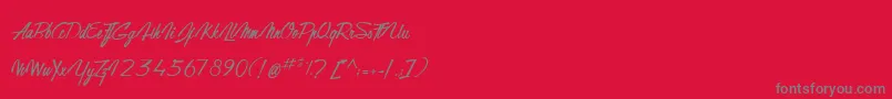 フォントGentlemanOnTheRainbow – 赤い背景に灰色の文字