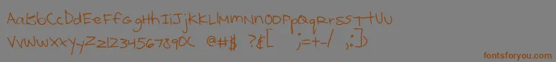 Kcirtap Font – Brown Fonts on Gray Background