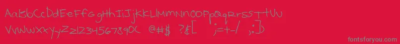 フォントKcirtap – 赤い背景に灰色の文字