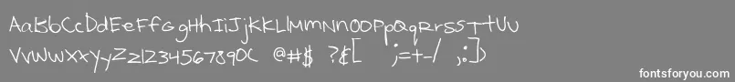 フォントKcirtap – 灰色の背景に白い文字