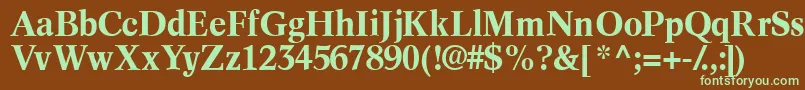 フォントInformaticssskBold – 緑色の文字が茶色の背景にあります。