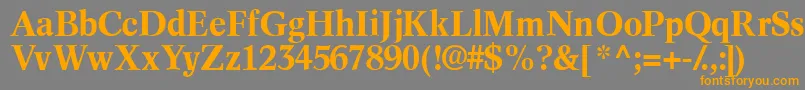 フォントInformaticssskBold – オレンジの文字は灰色の背景にあります。