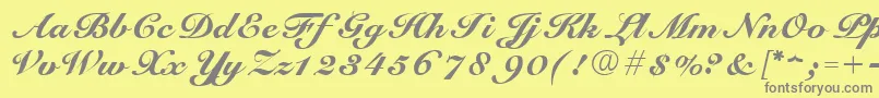 フォントScriptRoundhandNormal – 黄色の背景に灰色の文字