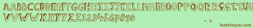 Hcapstrial Font – Brown Fonts on Green Background