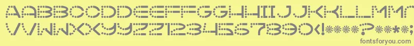 フォントVanish – 黄色の背景に灰色の文字