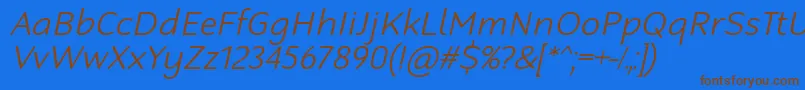 Fonte RobagaRoundedLightItalic – fontes marrons em um fundo azul
