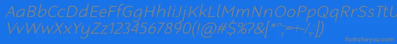 Czcionka RobagaRoundedLightItalic – szare czcionki na niebieskim tle