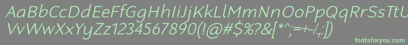 Fonte RobagaRoundedLightItalic – fontes verdes em um fundo cinza
