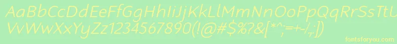 フォントRobagaRoundedLightItalic – 黄色の文字が緑の背景にあります