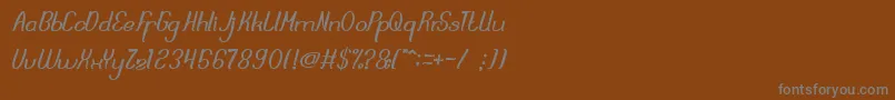 DreamReality Font – Gray Fonts on Brown Background
