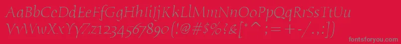 HumanaSerifItcLightItalic-Schriftart – Graue Schriften auf rotem Hintergrund