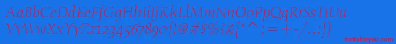 HumanaSerifItcLightItalic-Schriftart – Rote Schriften auf blauem Hintergrund
