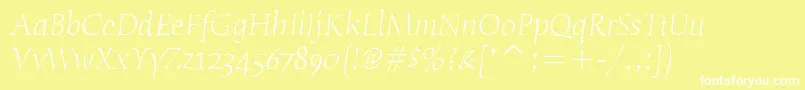 HumanaSerifItcLightItalic-Schriftart – Weiße Schriften auf gelbem Hintergrund