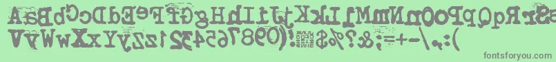 フォントTypistysRorrim – 緑の背景に灰色の文字