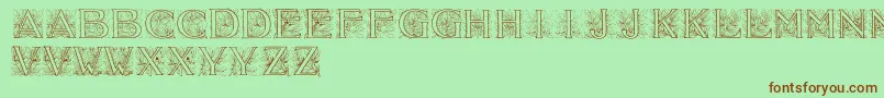 Acorninitials-Schriftart – Braune Schriften auf grünem Hintergrund
