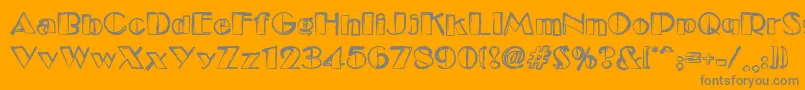 Dsetudec-Schriftart – Graue Schriften auf orangefarbenem Hintergrund