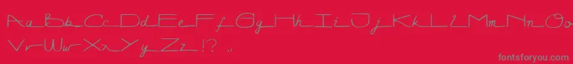 Lunagraph-Schriftart – Graue Schriften auf rotem Hintergrund