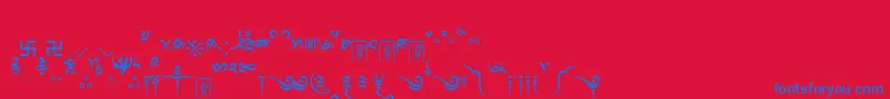 フォントTibetanmachineweb8 – 赤い背景に青い文字