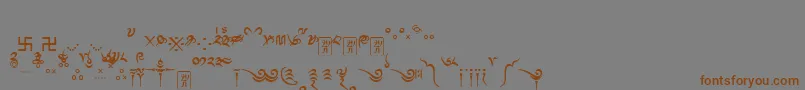 Tibetanmachineweb8-fontti – ruskeat fontit harmaalla taustalla