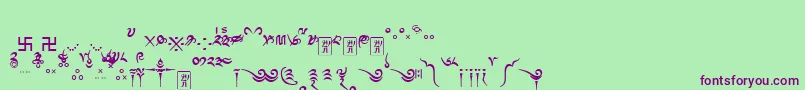 フォントTibetanmachineweb8 – 緑の背景に紫のフォント