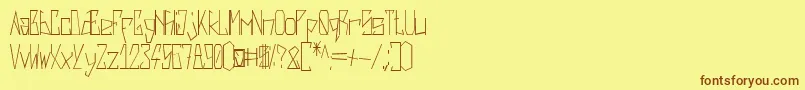 フォントHarshRegular – 茶色の文字が黄色の背景にあります。