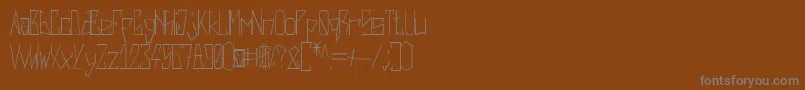 フォントHarshRegular – 茶色の背景に灰色の文字