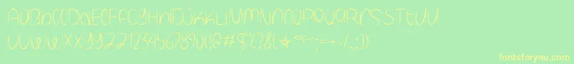 SpookyHalloweenTtf Font – Yellow Fonts on Green Background