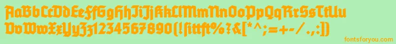 Tannenbergfett Font – Orange Fonts on Green Background