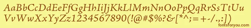 フォントAjensonproItcapt – 茶色の文字が黄色の背景にあります。