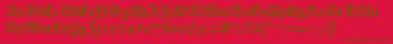 Maximilian-Schriftart – Braune Schriften auf rotem Hintergrund
