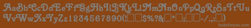 SalinaRegular-fontti – harmaat kirjasimet ruskealla taustalla