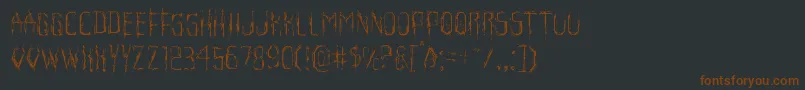 Horroroidlight Font – Brown Fonts on Black Background
