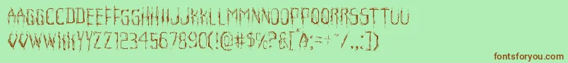 Horroroidlight Font – Brown Fonts on Green Background
