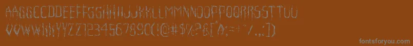 Horroroidlight Font – Gray Fonts on Brown Background