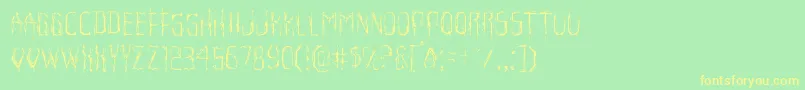 フォントHorroroidlight – 黄色の文字が緑の背景にあります