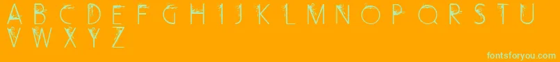 CurlyFleurCaps-Schriftart – Grüne Schriften auf orangefarbenem Hintergrund