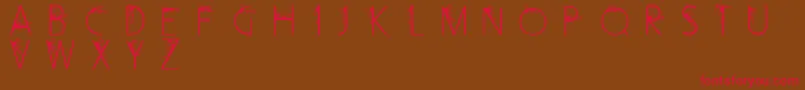 CurlyFleurCaps Font – Red Fonts on Brown Background