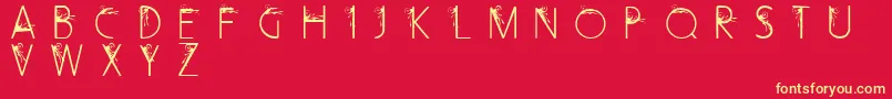 CurlyFleurCaps-Schriftart – Gelbe Schriften auf rotem Hintergrund