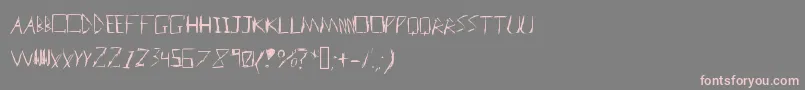 フォントBadhandwriter – 灰色の背景にピンクのフォント