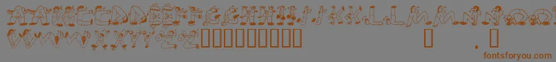 フォントEdbSweatinIt – 茶色の文字が灰色の背景にあります。