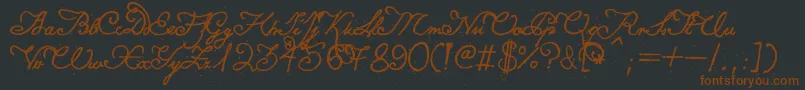 Konstytucjapolska-fontti – ruskeat fontit mustalla taustalla