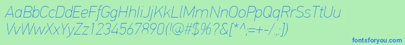 Fonte PfdintextproExtrathinitalic – fontes azuis em um fundo verde