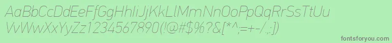 PfdintextproExtrathinitalic Font – Gray Fonts on Green Background