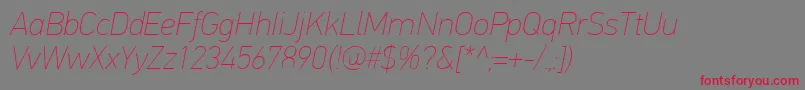 PfdintextproExtrathinitalic Font – Red Fonts on Gray Background