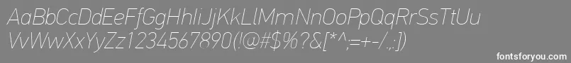 フォントPfdintextproExtrathinitalic – 灰色の背景に白い文字