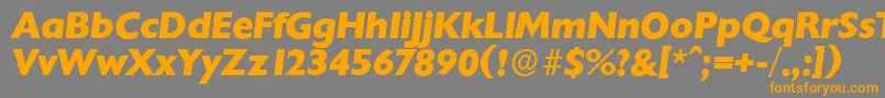 フォントChantillyserialXboldItalic – オレンジの文字は灰色の背景にあります。