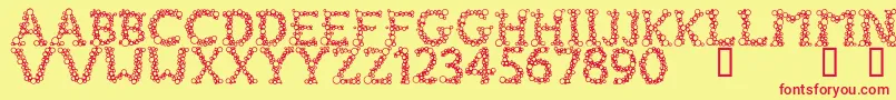 FizzoMedium-Schriftart – Rote Schriften auf gelbem Hintergrund