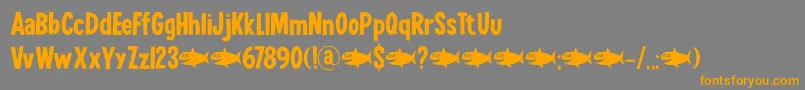 フォントLuckyGoldfishDemo – オレンジの文字は灰色の背景にあります。